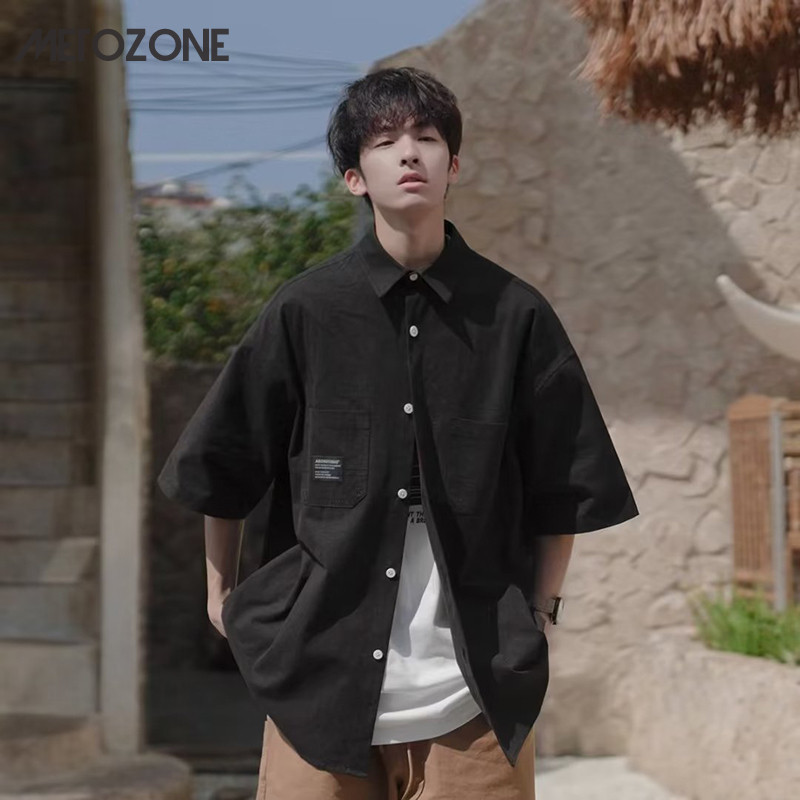 เสื้อเชิ้ตแขนสั้นลําลอง แบบบาง ทรงหลวม สีดํา แฟชั่นฤดูร้อน สไตล์ญี่ปุ่น และฮ่องกง สําหรับผู้ชาย
