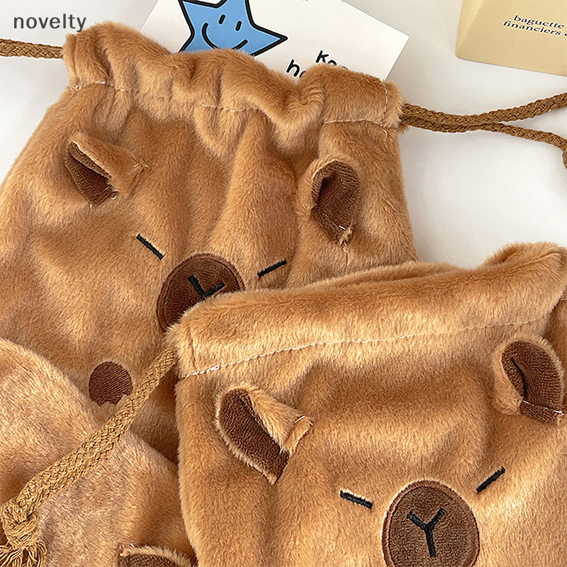 Nly ใหม่ Capybara Plush Porpoise Drawstring Bundle กระเป๋าแบบพกพา Plush กระเป๋าขนาดใหญ่ความจุกระเป๋าถือ Casual น้ําหนักเบากระเป๋าเดินทาง N