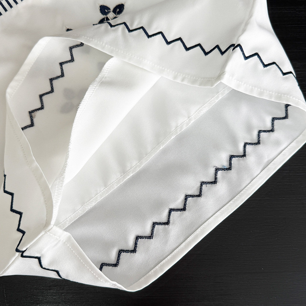 หมีผู้นําเกาหลีรุ่นดอกไม้เย็บปักถักร้อยเสื้อยืดด้านบน + กระโปรงชุดสองชิ้น 3-7 ปีแขนกุดธรรมดาสาวเสื้อผ้า รายา สวมใส่