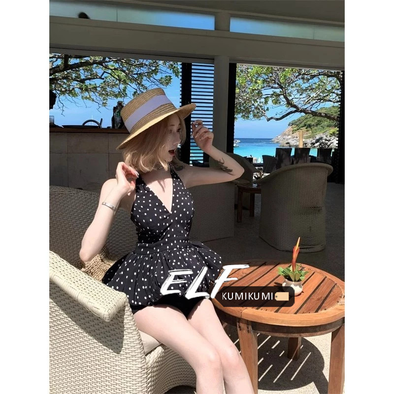 ELFwoo เสื้อกั๊กคอวีลายจุดสีดําสําหรับผู้หญิงในช่วงฤดูร้อนที่มีดอกตูมที่สวยงามที่เอวและด้านหลังออกแบ