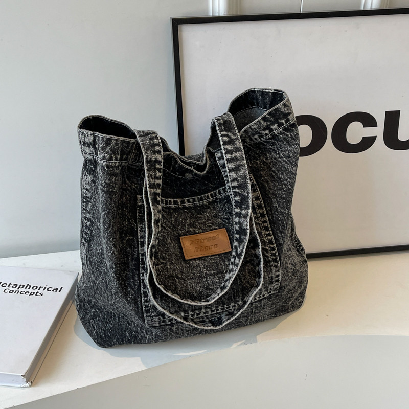เวอร์ชั่นเกาหลีกระเป๋าสะพายอินเทรนด์แฟชั่น All-Match Tote Bag Denim กระเป๋าสะพายความจุขนาดใหญ่ทนทาน Anti-Theft Tote Bag Leisure Travel Fe