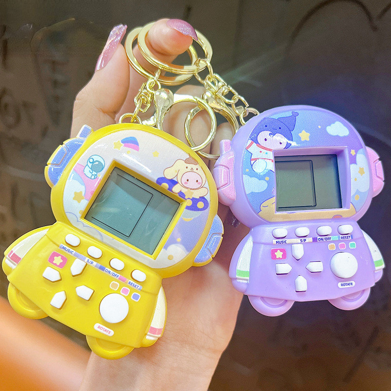 Creative Handheld Mini นักบินอวกาศเกมคอนโซลพวงกุญแจการศึกษา Decompression ของเล ่ นพวงกุญแจจี ้ กุญแจรถกระเป ๋ านักเรียนจี ้ วันหยุดของขวัญขนาดเล ็ ก