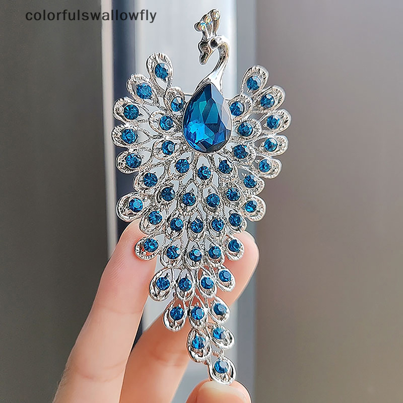 Colorfulswallowfly เข็มกลัดแฟชั่น รูปนกยูง ประดับพลอยเทียม เครื่องประดับ สําหรับงานแต่งงาน ปาร์ตี้ ของขวัญ COD