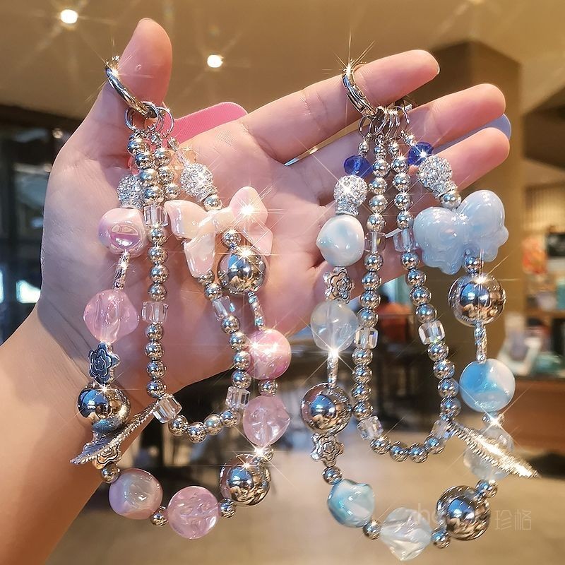 เชือกเส้นเล็กโทรศัพท์มือถือโซ่คู่ขนนกโซ่แขวนข้อมือสั้นเครื่องประดับโทรศัพท์มือถือแขวนโซ่เชือกแถบบัตรปะเก็นกรณีโทรศัพท์มือถือสากล