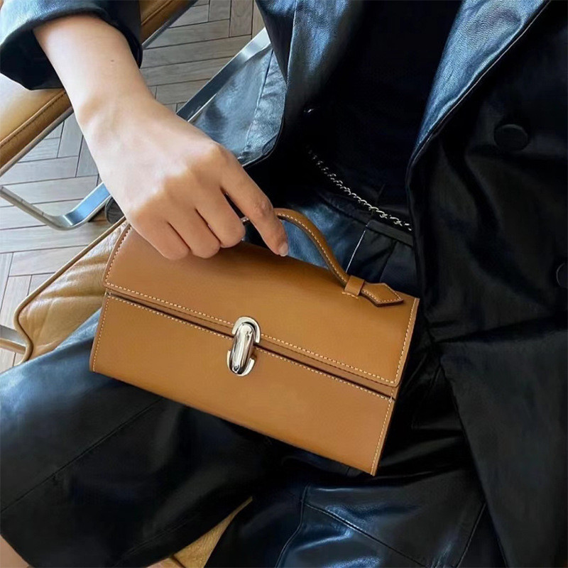 Savette Handbag cowhide กระเป๋าสะพายข้าง  การออกแบบเล็กน้อย หนังนิ่มมือแฟชั่นกระเป๋าหิ้ว