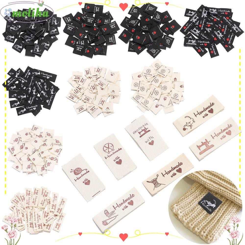 Moliha 50PCS ป ้ ายเสื ้ อผ ้ ารูปหัวใจถักขนสัตว ์ การ ์ ตูนแมวเสื ้ อผ ้ าแท ็ ก
