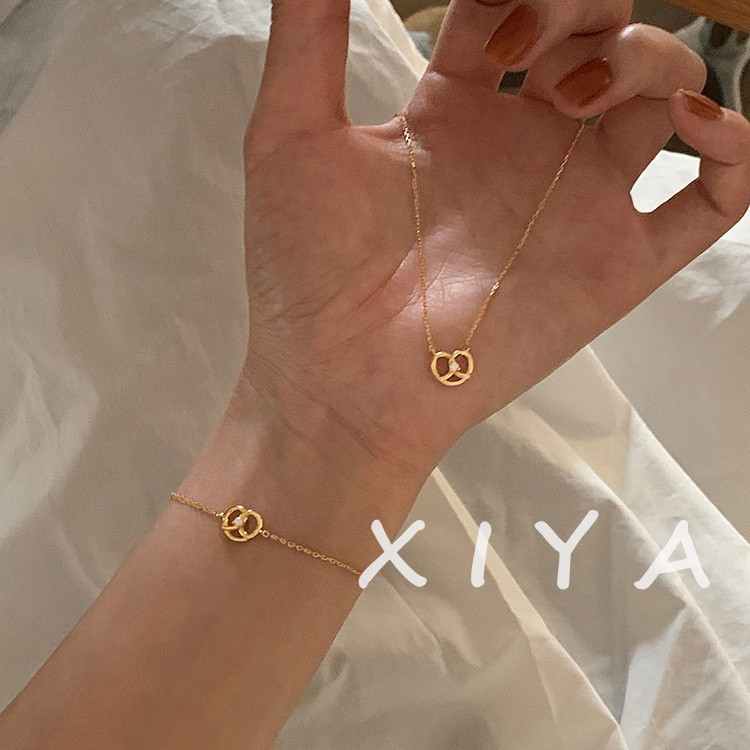 Xiya แฟชั่น Simple Hollow Heart สร้อยคอด่างขนมปังน้ําสร้อยข้อมือเพทาย