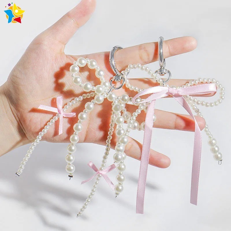 แฟชั่น Sweet Cool Bowknot ริบบิ้นพวงกุญแจ Y2K สไตล์เลียนแบบมุกลูกปัดโบว์กระเป๋า Charm ตกแต่งโทรศัพท์สายคล้องเครื่องประดับของขวัญ