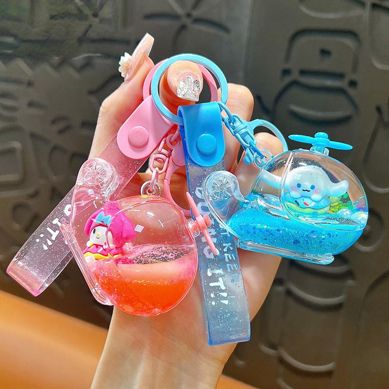 Creative Oil Sanrio พวงกุญแจเครื่องบินอบเชยสุนัข Melody อะคริลิค Liquid Glitter พวงกุญแจกุญแจรถจี้กระเป๋านักเรียนจี้ของขวัญวันหยุด