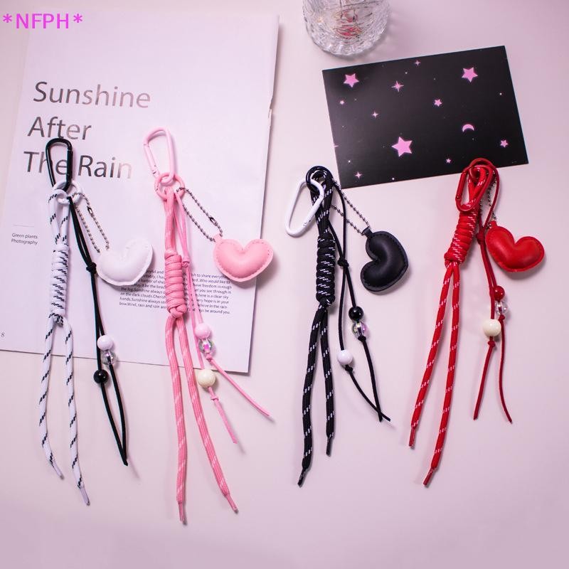 NFPH> สีสันเชือกมือปมโรมันพวงกุญแจจี้หนังหวานหัวใจเสน่ห์กระเป๋าแฟชั่นเครื่องประดับพวงกุญแจรถของขวัญใหม่ ราคาถูก Shopee Lazada