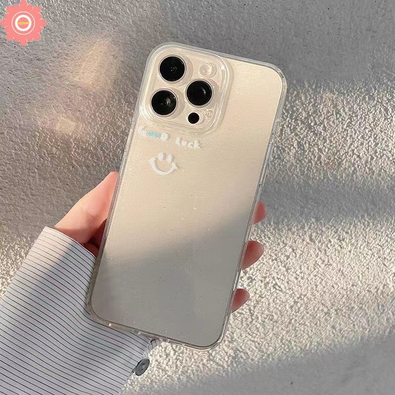 เคสโทรศัพท์มือถือแบบนิ่ม ใส ลายหน้ายิ้ม แต่งกลิตเตอร์ พร้อมสายคล้องข้อมือ และผงกลิตเตอร์ หรูหรา สําหรับ IPhone 11 15 14 13 12 Pro Max 7Plus 15 6 7 14 8 6s Plus XR X XS Max SE 2020
