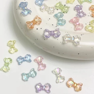 30 ชิ้น 8.7*14.7 มม.เงา AB ขนาดเล็ก Bowknot ลูกปัดโปร่งใสทําโทรศัพท์มือถือ DIY เครื่องประดับอุปกรณ์เสริมวัสดุตกแต่ง