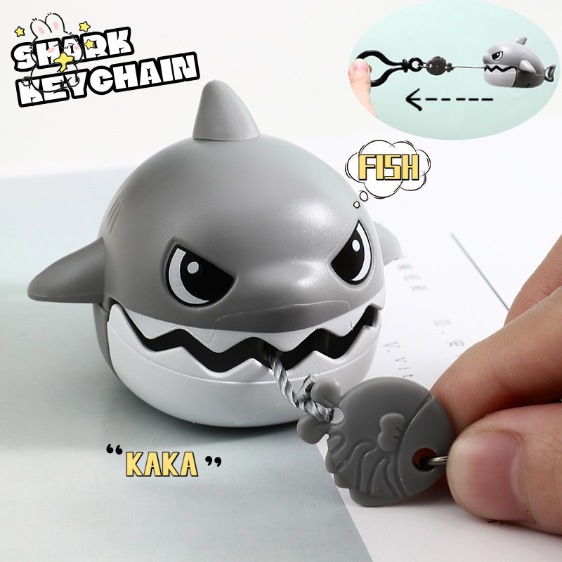 น ่ ารักการ ์ ตูน Shark พวงกุญแจ Creative Shark กระเป ๋ าจี ้ Drawstring Clockwork ของเล ่ น