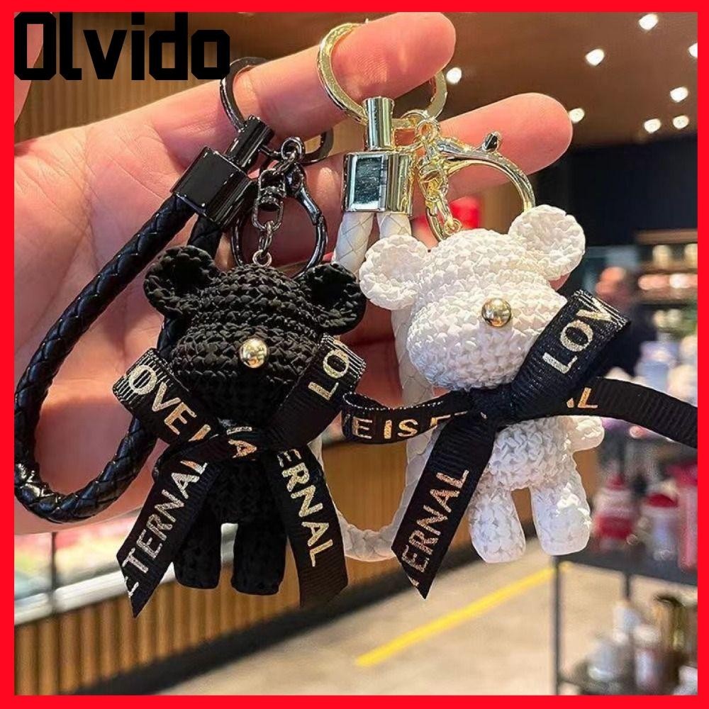 จี้ตุ๊กตาเรซิ่น OLVIDO, พวงกุญแจหมีถักแบรนด์อินเทรนด์ Diy, อุปกรณ์เสริมกระเป๋าพวงกุญแจคู่รักแฟชั่น