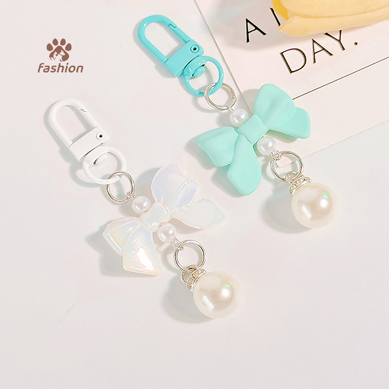 [แฟชั่น] โบว์สีลูกกวาดจี้พวงกุญแจแฟชั่น Y2K พวงกุญแจเคสหูฟัง Charm กระเป๋าจี้กระเป๋าถืออุปกรณ์เสริม {TH}
