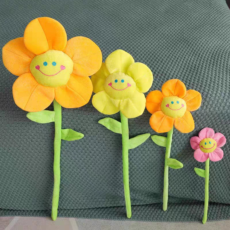 ตุ๊กตาหน้ายิ้มแย้มดอ