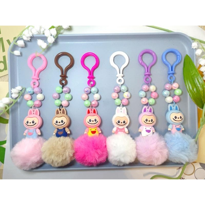 พวงกุญแจ จี้ตุ๊กตา PVC รูปการ์ตูน ลาบูบู ป้องกันการสูญหาย สําหรับตกแต่งกระเป๋าเป้สะพายหลัง น้อนลาบูบู้ประดับปอมๆพร้อมส่ง