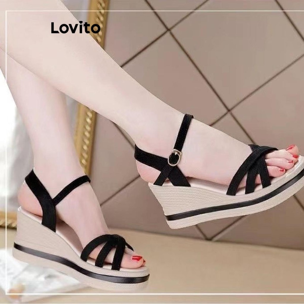 Lovito สง่างามสีพื้นไขว้อเนกประสงค์พื้นหนาเพิ่มความสูง Wedges สําหรับผู้หญิง  LFA65254