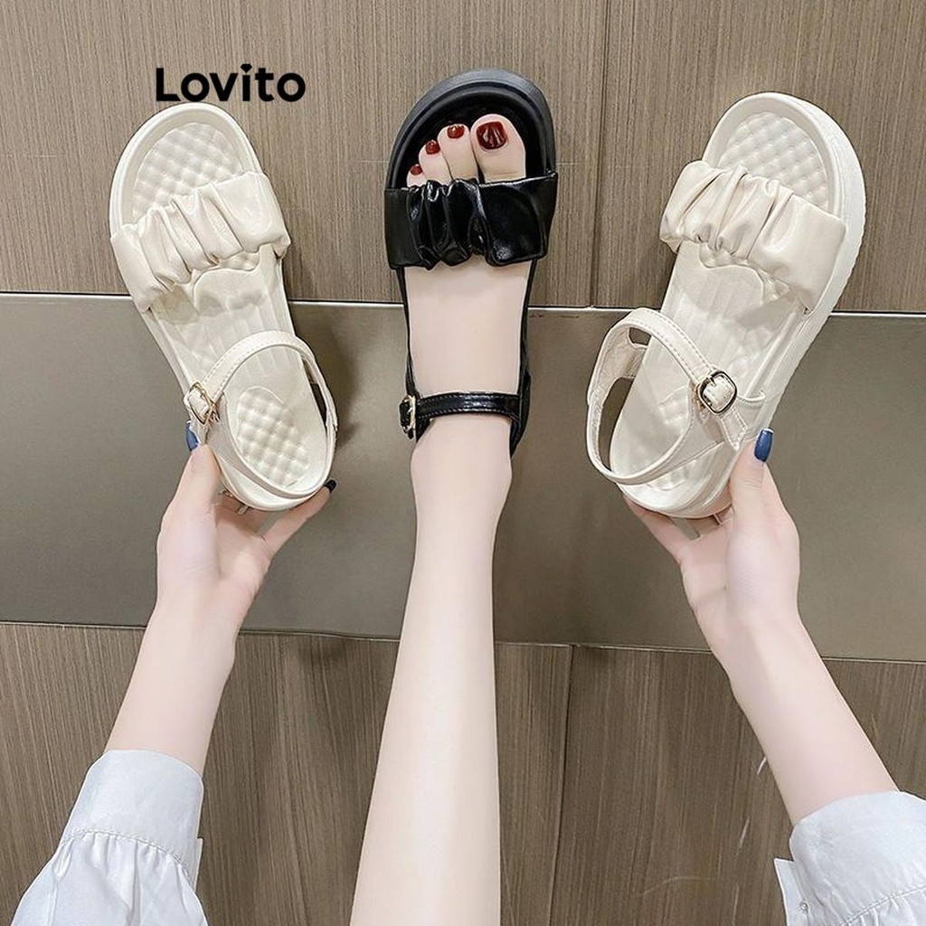 Lovito รองเท้าแตะผู้หญิง ส้นเตี้ย พื้นหนา ใส่สบาย แต่งจีบ สีเรียบ สไตล์ลำลอง LFA27030
