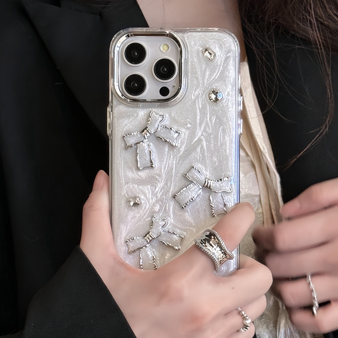 เคสโทรศัพท์มือถือ ซิลิโคนนุ่ม เรซิน โลหะ ลายโบว์ สีขาวประกาย สําหรับ IPhone 11 12 13 14 15 Pro Max 14 15 Plus
