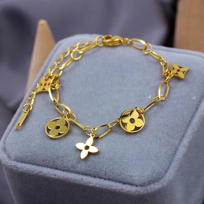 สร้อยข้อมือเด็กผู้หญิง Gold Titanium Non-fading Four-leaf Clover จี้สร้อยข้อมือเพชรรูป Floret สร้อยข้อมือสําหรับผู้หญิงเครื่องประดับ