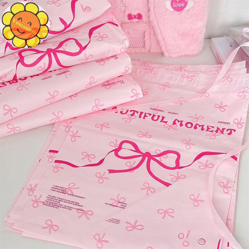 Yescont 10 ชิ้นพลาสติกสีชมพู Courier กระเป๋า Bow Knot พิมพ์ Express ซองจดหมายเสื้อผ้าจัดส่งซองจดหมาย Self กาว Mailing กระเป๋า TH