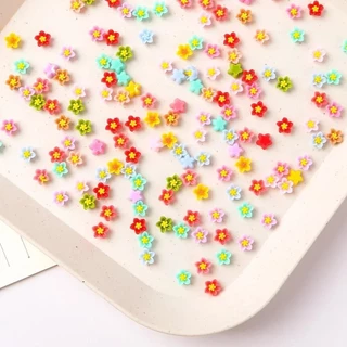 100ชิ้นที่มีสีสันมินิผสมดอกไม้แบนกลับเรซิ่นดอกไม้การ์ตูน ทําเอง เครื่องประดับเสน่ห์หัตถกรรมตกแต่งสาวตกแต่งเล็บ