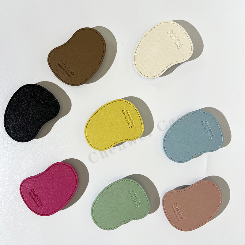 Ins ร ้ อนไม ่ สม ่ ําเสมอวงเล ็ บ PU หนังผู ้ ถือโทรศัพท ์ มือถือสําหรับ iPhone Android คริสตัลใสถุงลมนิรภัยโทรศัพท ์ Grip