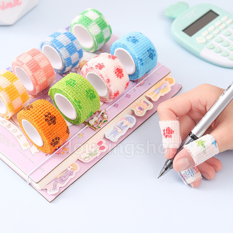 ผ ้ าพันแผลนิ ้ วสีป ้ องกันนิ ้ วนักเรียนผ ้ าพันแผลยืดหยุ ่ นมีกาวในตัวป ้ องกันการสึกหรอและป ้ องกันแคลลัสผ ้ าไม ่ ทอสําหรับการป ้ องกันนิ ้ ว