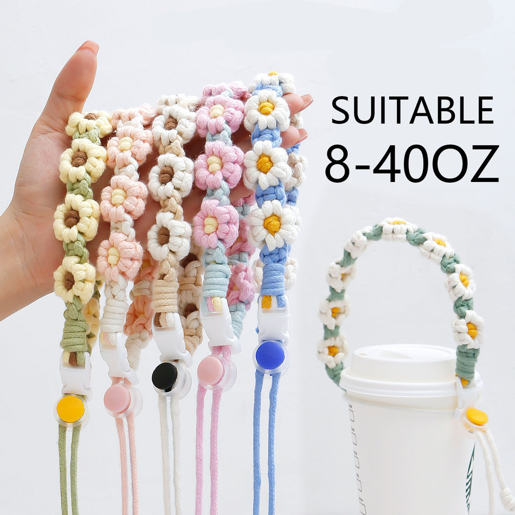 ทอมือถ้วยน้ํากีฬาสายคล้องมือความรู้สึกระดับไฮเอนด์เดซี่ถ้วยน้ําแบบพกพาบรรจุเชือกมือ