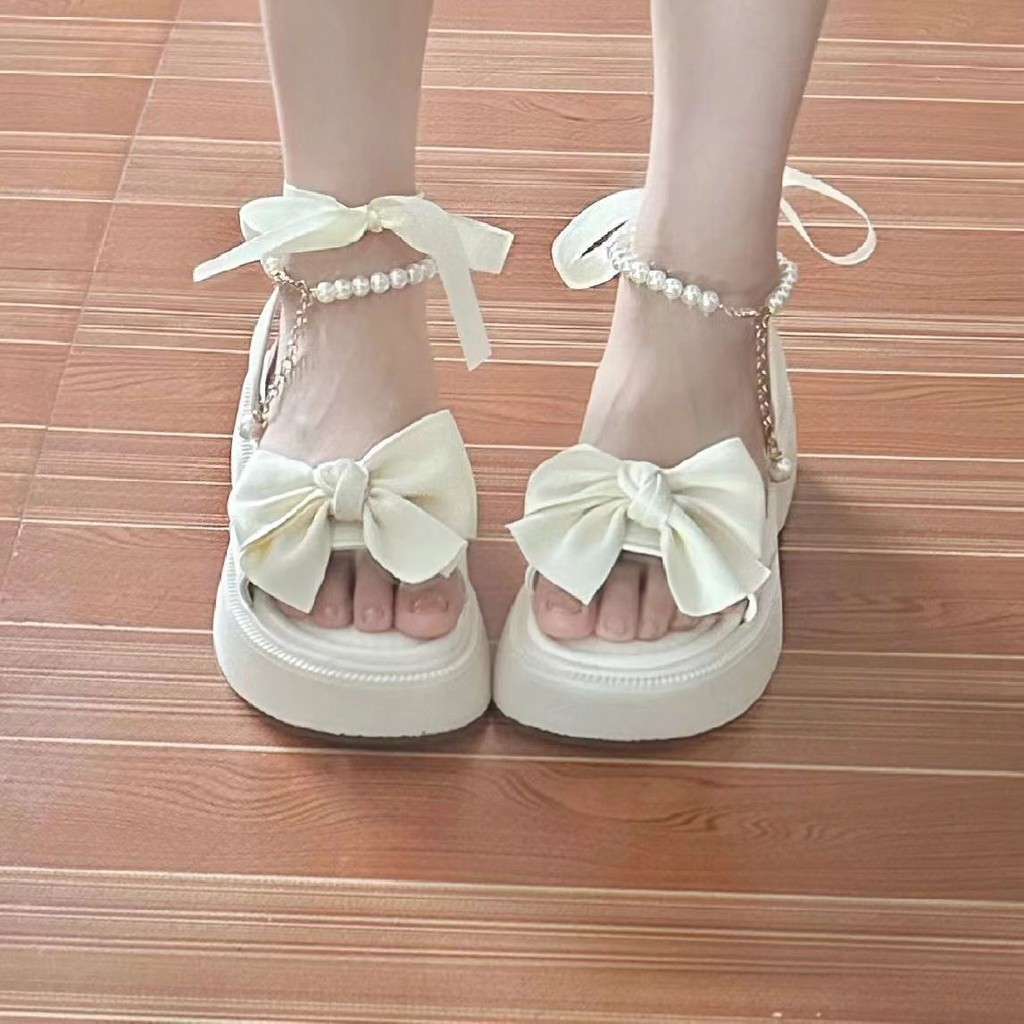 🎀พร้อมส่ง🎀รองเท้าแตะผู้หญิงสไตล์เกาหลี รองเท้าแตะส้นหนา พื้นหนา เปิดนิ้ว ประดับด้วยโบว์และไข่มุก