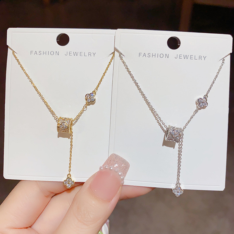 หรูหราการออกแบบ High-End ความรู ้ สึกเอวเล ็ กสี ่ ใบพู ่ ดอกไม ้ อารมณ ์ หวานแฟชั ่ น Clavicle Cha