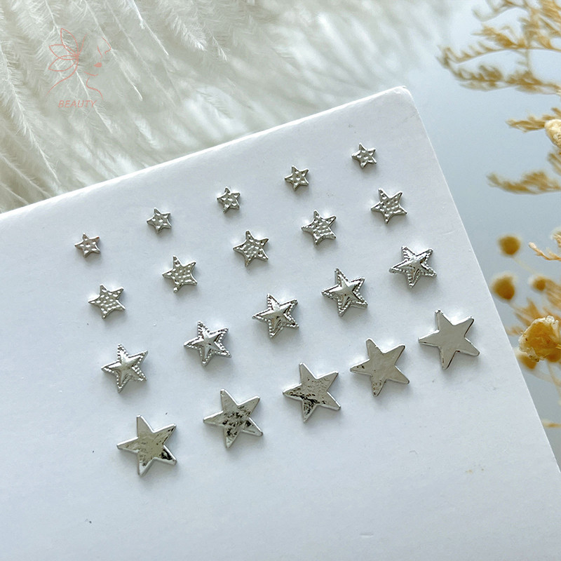 [maybeauty] 10 ชิ้น Silvery Star Nail Art Ch 3D Alloy Five-Pointed-Star Silver Crystal Diamond Nail Decorative อุปกรณ์ทําเล็บ {TH}