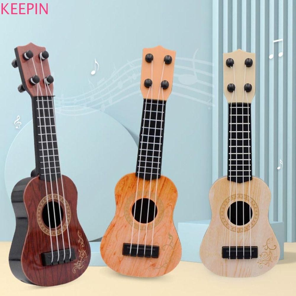 Keepin อูคูเลเล่คลาสสิก Mini 4 Strings เครื่องดนตรี Stringed Instrument Early Education ของเล่น Montessori กีตาร์ขนาดเล็ก