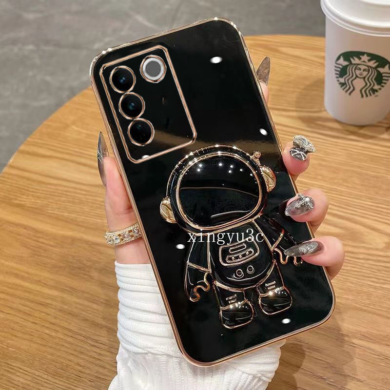 ปลอก Vivo V29 5G Vivo v27 5G V25 V25E V27E V23 5G V23E V21 5G V20 Pro V20 SE นักบินอวกาศรูปไฟฟ้าเคสโทรศัพท์พร้อมวงเล็บหมุนได้ 360 องศาซิลิโคนเคสโทรศัพท์มา