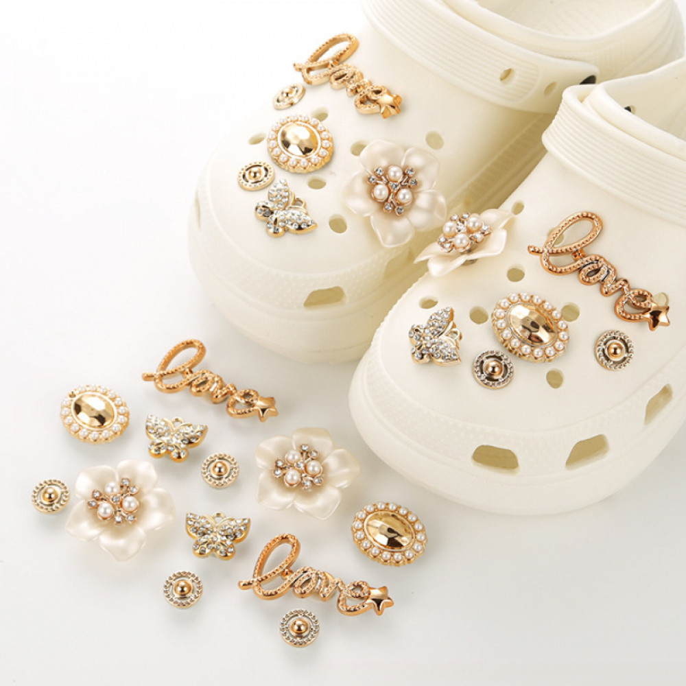 Sense of advanced Pearl ดอกไม้ 12 ชิ้น/เซ็ต Cross jibz Hole รองเท้า Charm อุปกรณ์เสริมรองเท้าแตะ DIY ตกแต่งหัวเข็มขัดสําหรับ croc