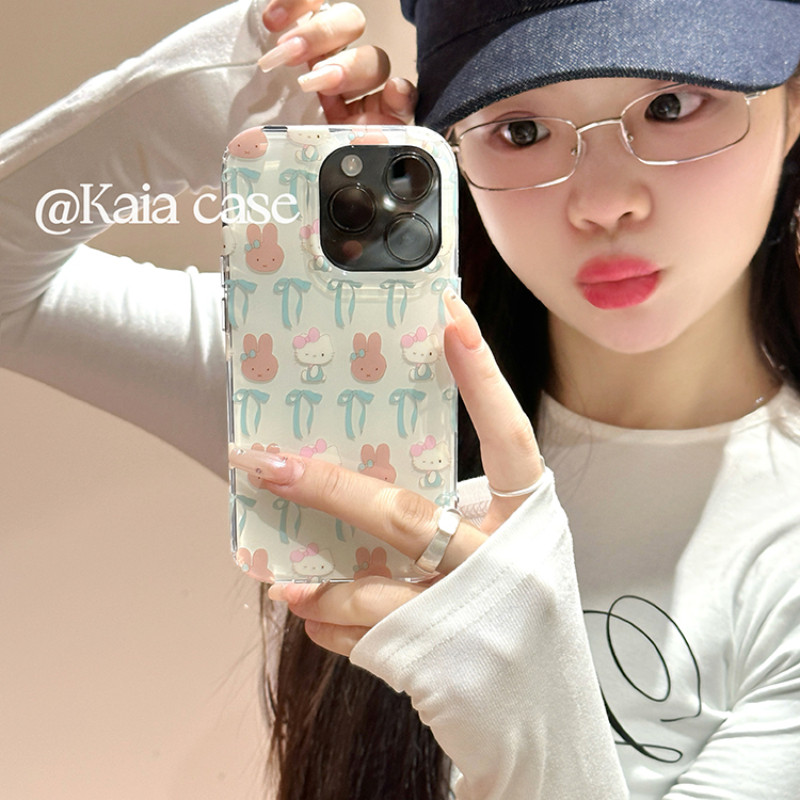 Huiwanju การ์ตูนน่ารัก kt bow เหมาะสําหรับเคสโทรศัพท์มือถือ iPhone16promax ip13 ใหม่ 15 ผู้หญิง 14pr