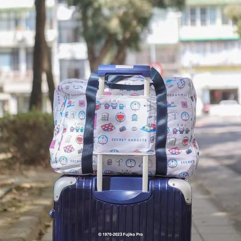 กระเป๋าเก็บของ กระเป๋าสัมภาระมือ ลายการ์ตูน โดราเอมอน พับเดินทางขนาดใหญ่-ความจุแบบพกพาแบบพกพาไหล่ข้างเดียวกริ๊งแมว