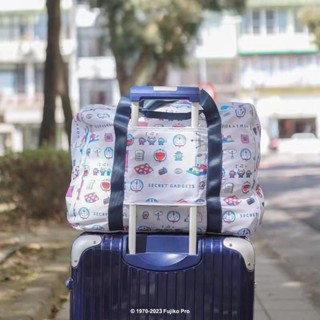 กระเป๋าเก็บของ กระเป๋าสัมภาระมือ ลายการ์ตูน โดราเอมอน พับเดิ…