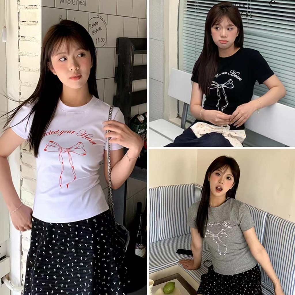 cherryshop🍒พร้อมส่ง เสื้อยืดผู้หญิง เสื้อรัดรูป แฟชั่นแขนสั้น พิมพ์ลายโบว์ฤดูร้อน น่ารัก คอกลมสไตล์เกาหลี