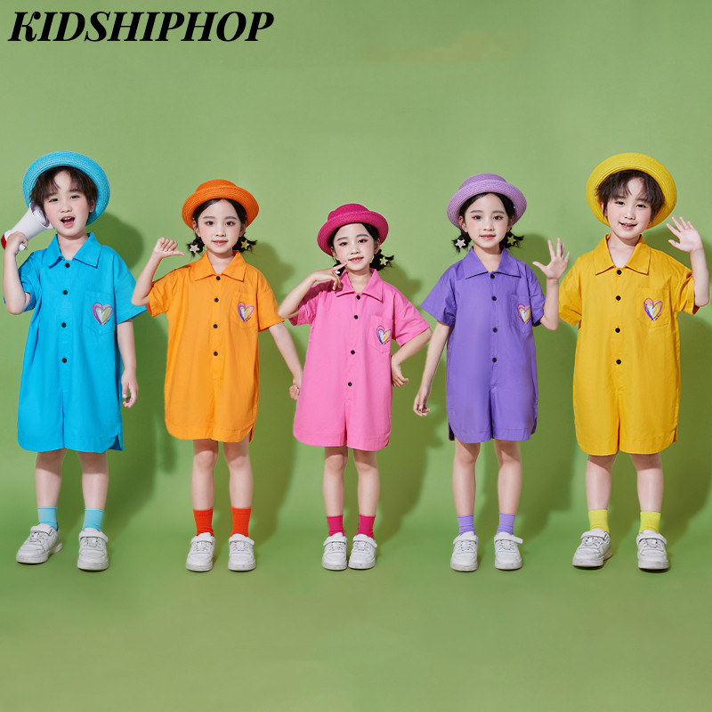 เครื่องแต่งกายการแสดงวันเด็กเสื้อผ้าสีสันสดใสสําหรับเทศกาลสาดน้ําเสื้อผ้าทีมเชียร์ลีดเดอร์เด็กจั๊มสูทน่ารักชุดบอดี้สูทโดปามีน