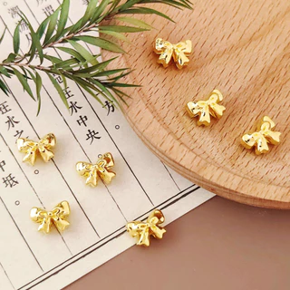 10 ชิ้น diy สร้อยข้อมือลูกปัดอุปกรณ์เสริมโลหะผสมโบว์ spacer ลูกปัด