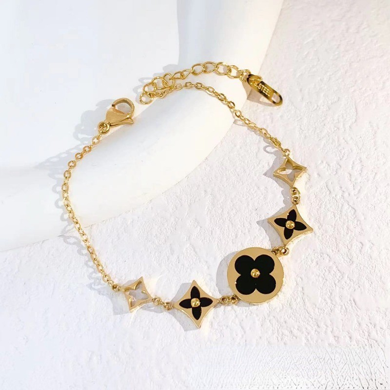 แฟชั่นคุณภาพสูงเพชร/รอบ Four-Leaf Clover สร้อยข้อมือเหล็กไทเทเนียมหญิงประณีต All-Match สร้อยข้อมือแฟชั่นเครื่องประดับ  ของขวัญ