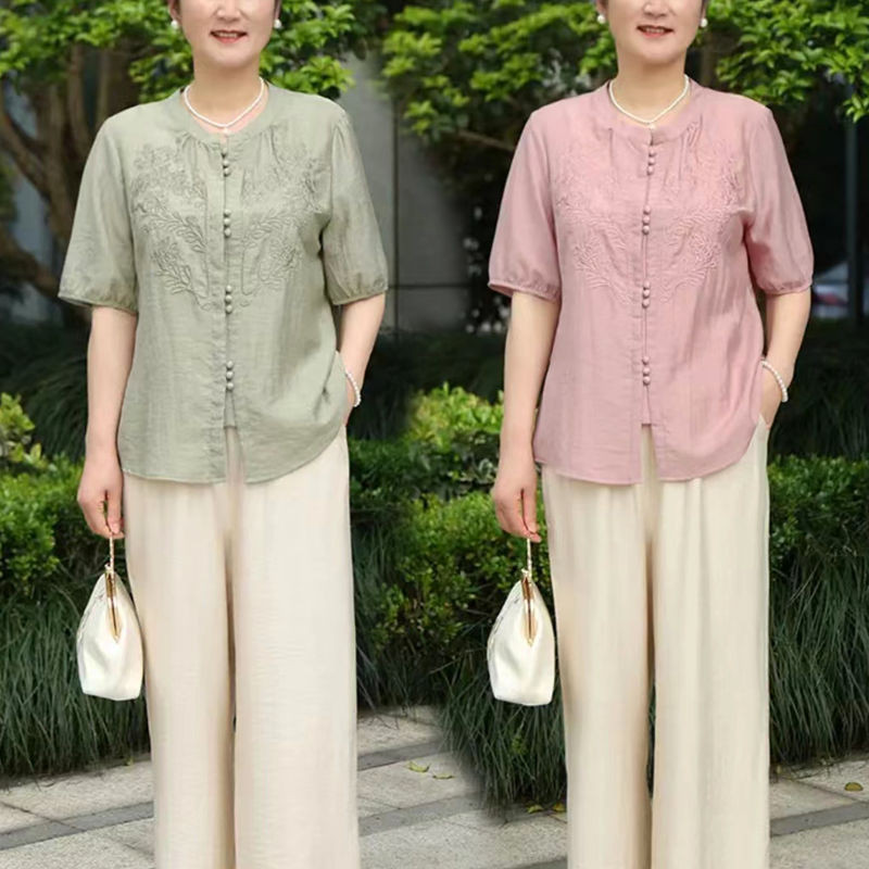 ใหม่สไตล์จีนวัยกลางคนผู้สูงอายุชุดแม่แขนสั้นคาร์ดิแกนด้านบน2024แฟชั่นสีทึบปักเสื้อสไตล์จีนใหม่กลางผู้สูงอายุแม่เสื้อผ้าแขนสั้นคาร์ดิแกนด้านบน2024แฟชั่นสีทึบ จ
