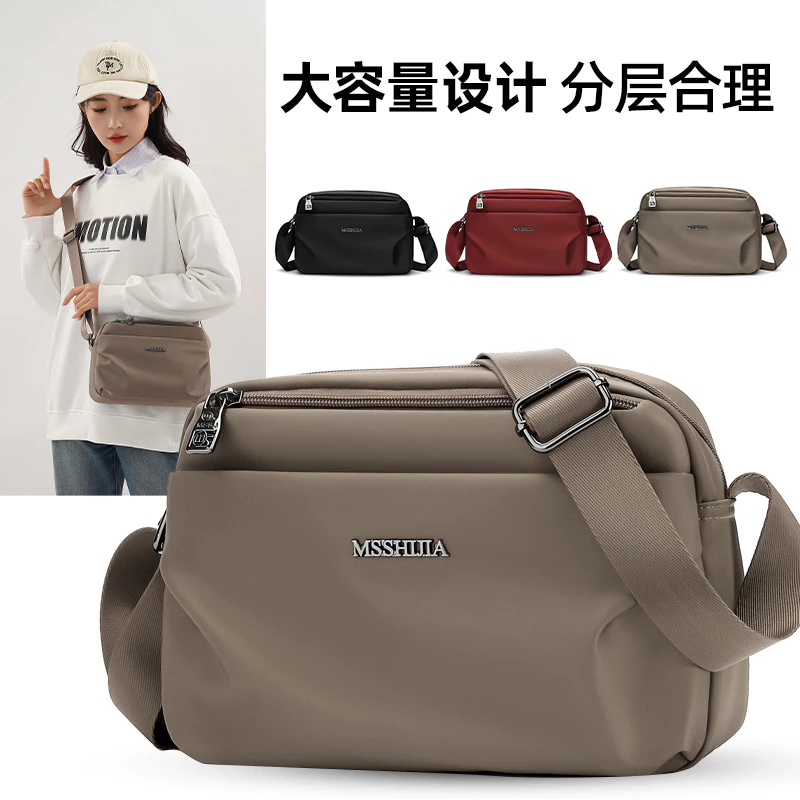 สุภาพสตรีสีทึบไหล่ขนาดใหญ่ความจุ Multi-pocket Commuter Messenger กระเป๋าแฟชั่นหญิงกระเป๋า Messenger กระเป๋าสะพาย F