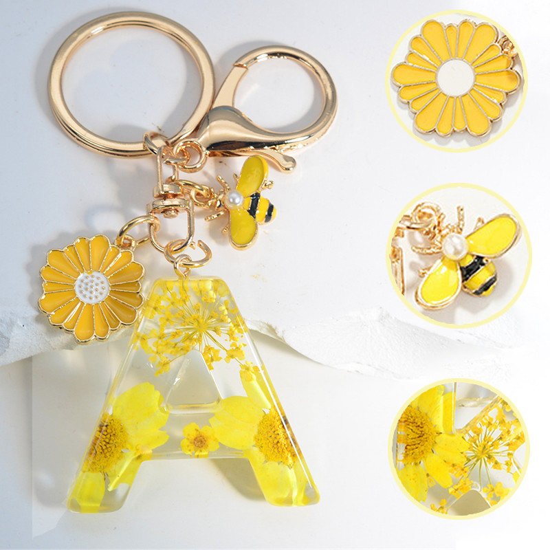 น ่ ารักการ ์ ตูน Bee Key Chain แฟชั ่ นดอกไม ้ แห ้ ง Drop กาวเรซิ ่ น Key แหวน Daisy จี ้ ผู ้ ถือกุญแจรถผู ้ หญิงกระเป ๋ าสาวเครื ่ องประดับ