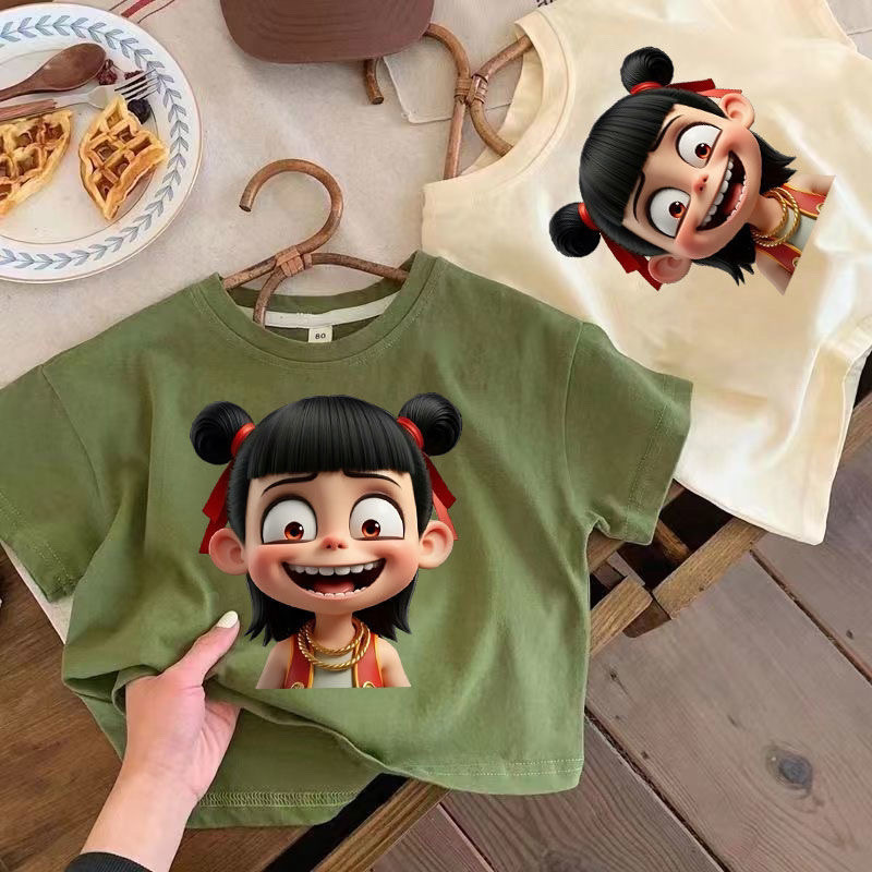 เสื้อผ้า Nezha เสื้อผ้า Nezha เสื้อผ้าเด็ก Nezha เสื้อยืดเด็ก 2025 เด็กการ์ตูน All-Match ผ้าฝ้ายแท้แ