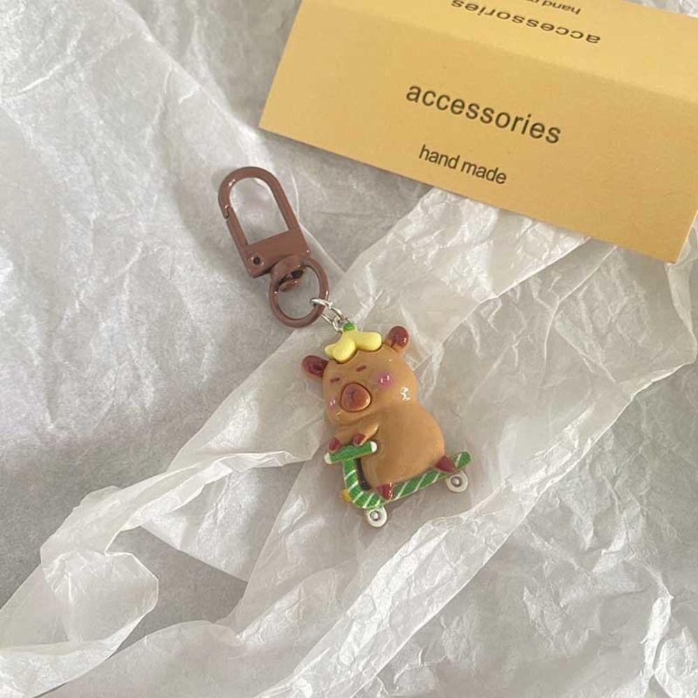 ROSEGOOD พวงกุญแจ Capybara, พวงกุญแจการ์ตูนสร้างสรรค์, ไม้แขวนเสื้อกระเป๋าเป้สะพายหลัง Kawaii Aqua Dolphin - รูปที่ 3