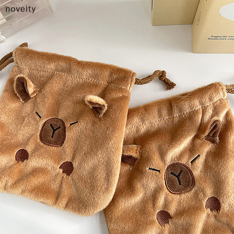 Nly ใหม่ Capybara Plush Porpoise Drawstring Bundle กระเป๋าแบบพกพา Plush กระเป๋าขนาดใหญ่ความจุกระเป๋าถือ Casual น้ําหนักเบากระเป๋าเดินทาง N