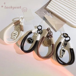 สีดําและสีขาวแมวและปลาขนาดเล็กคู่เชือกแขวนเชือกเส้นเล็กที่สําคัญเชือกเส้นเล็กป้องกันอุปกรณ์เสริมโทรศัพท์